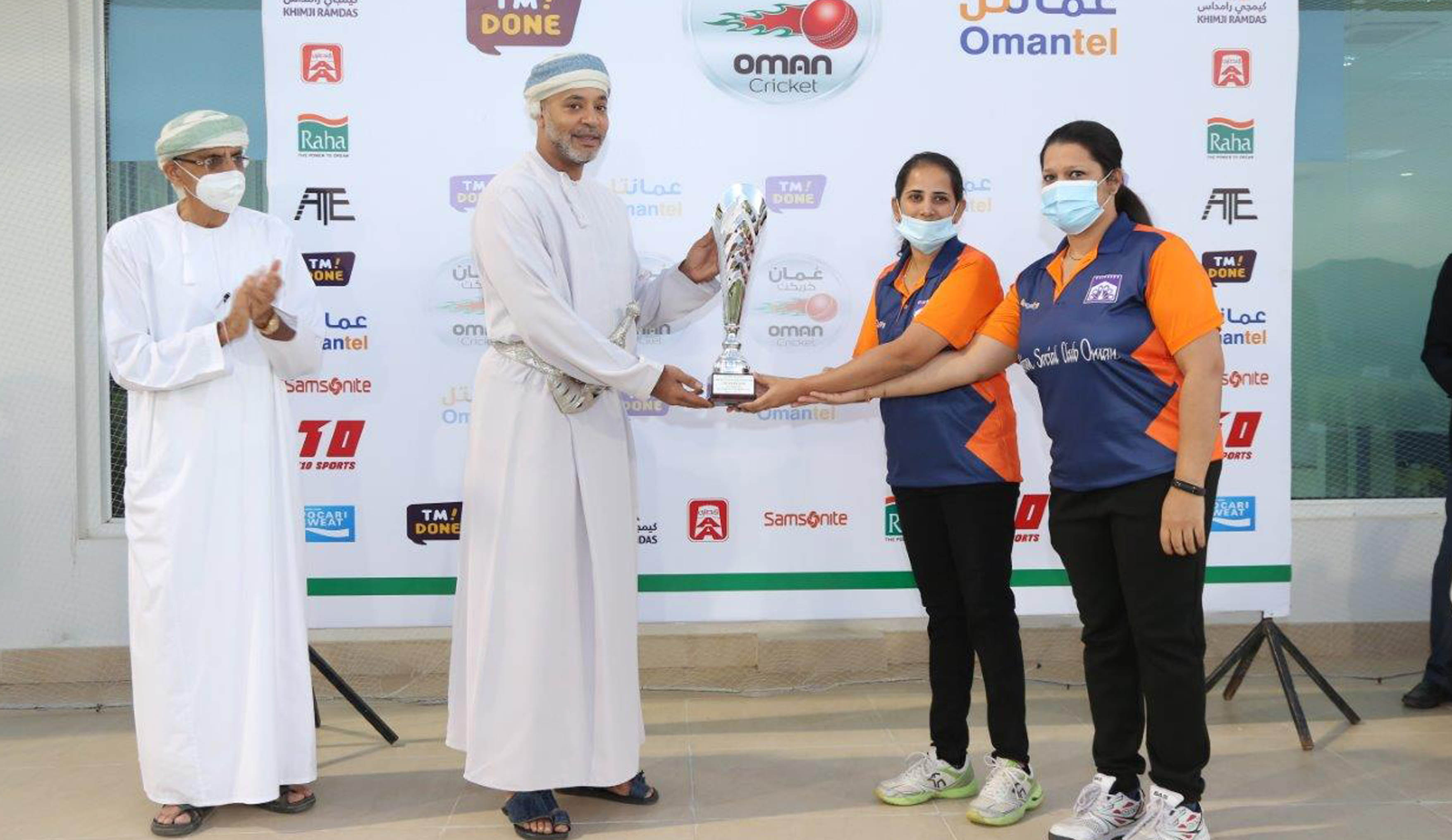 Indian Social Club captain receiving the WInner's Trophy from OC Vice Chairman Janab Al Sayyid Qaid halid Al Said