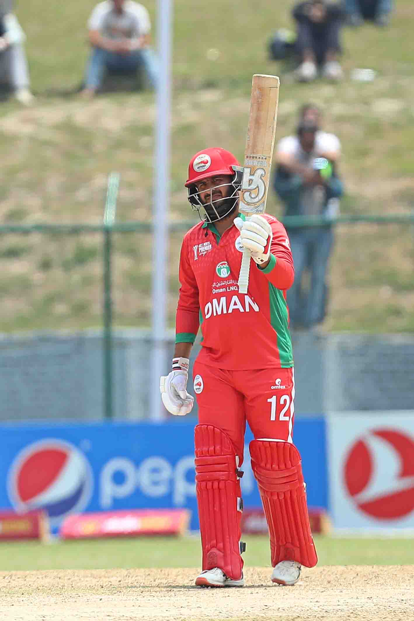 Zeeshan Maqsood (c) of Oman celebrates his fifty during the ACC Men’s Premier Cup 2023 Group A match between Oman and Saudi Arabia held at the Tribhuvan University International Cricket Ground in Kathmandu on the 26th April 2023 Photo by: Anshuman Akash/ Creimas / Asian Cricket Council