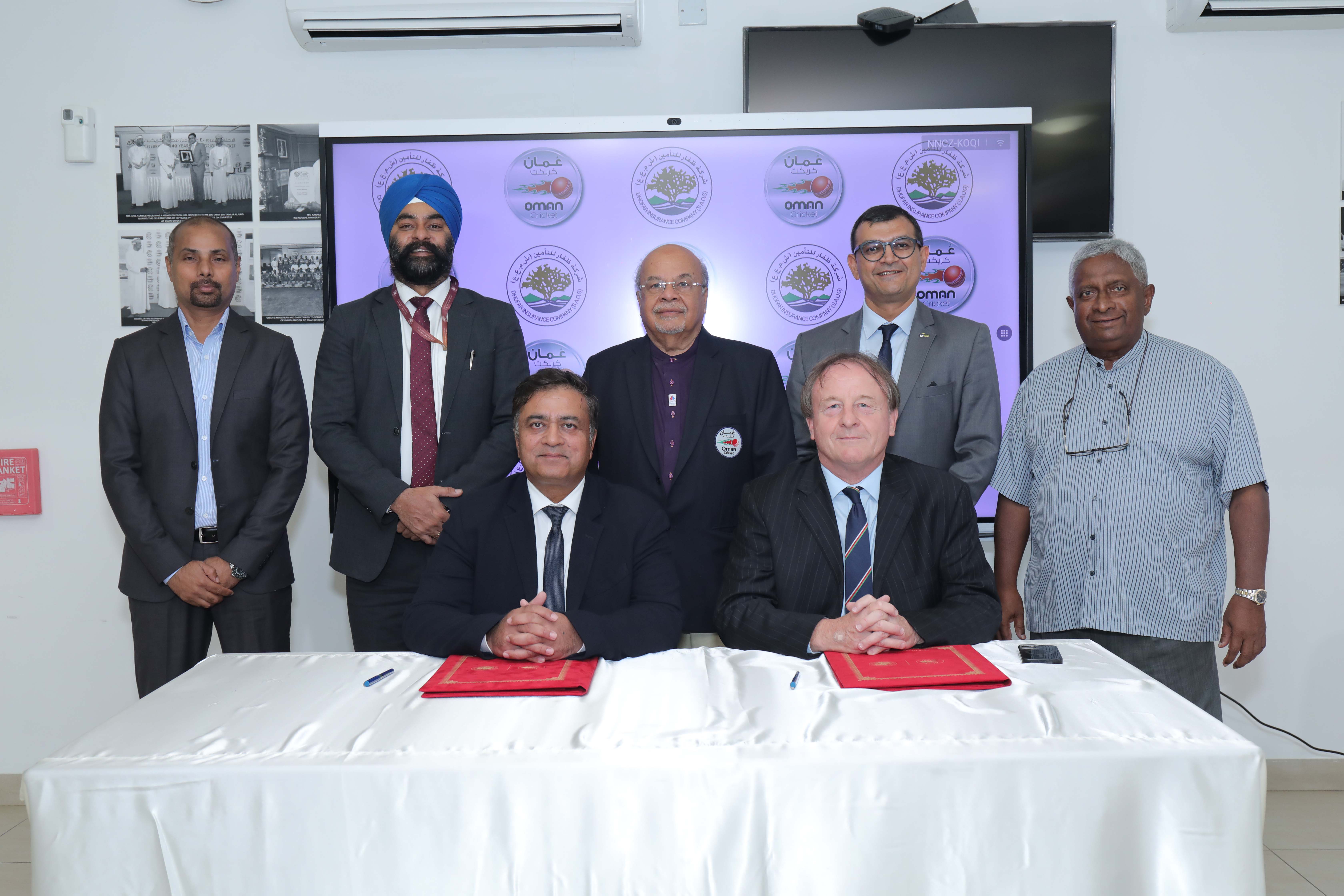 OC and Dhofar Insurance Company officials at the signing ceremony